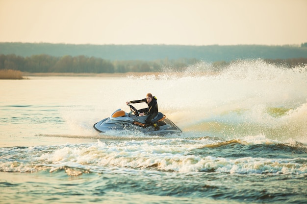 A man rides a hydrocycle