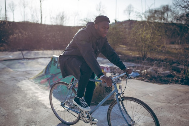 Man riding bicycle on street