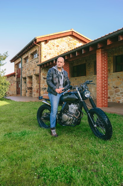 Man riding custom motorbike