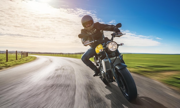 Man riding motorcycle on road