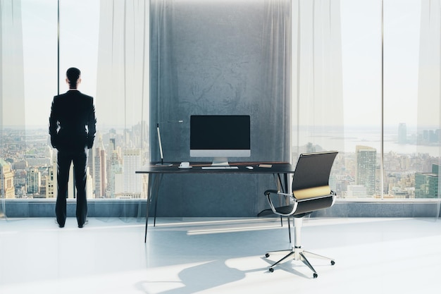 Man in room with workplace