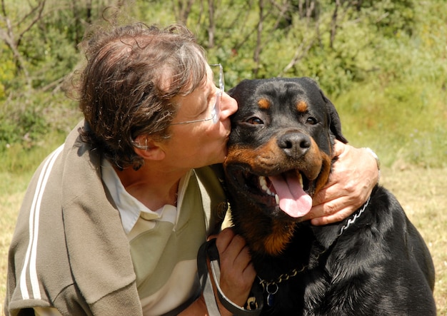 Man and rottweiler