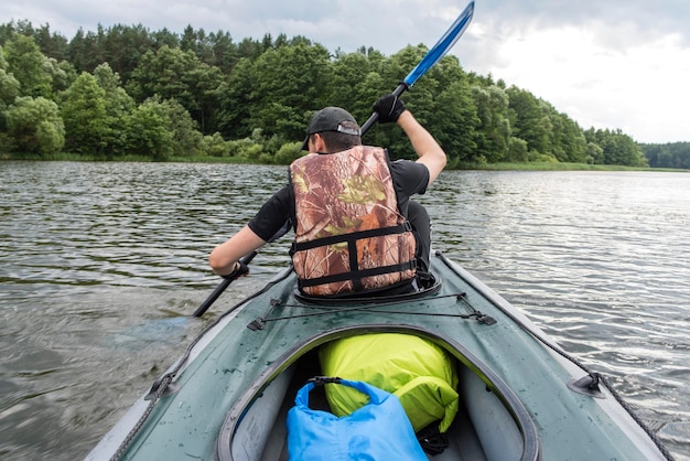 A man rowing a kayak