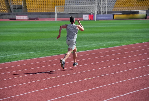 Man running fast in road stamina and endurance