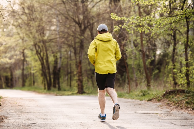 Man running in the morning in a park