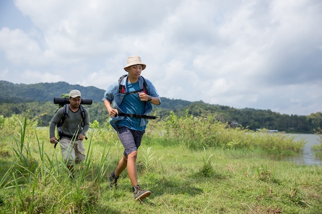 Man running while hiking in outdoor