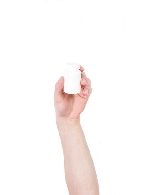 Man's arm raised holding a plastic container isolated on a white background - recycling concept