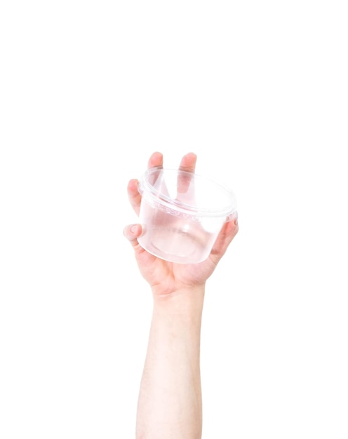 Man's arm raised holding a plastic container isolated on a white background - recycling concept