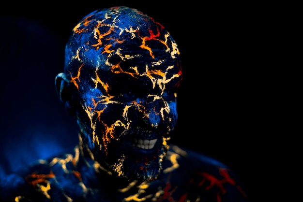 Man's  Face Painted in Neon UV Lava