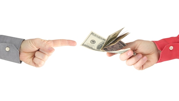 man's hand gives dollar bills to other people.