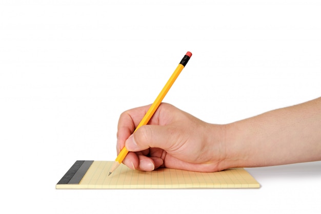 Man's hand holding a pencil on a note paper.