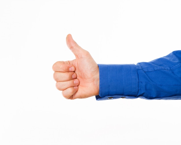 Man's hand showing thumbs up sign