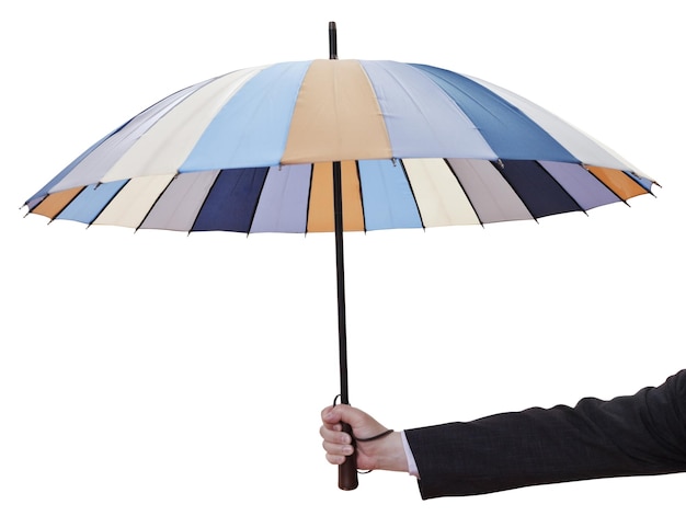 Man's hand with open striped umbrella