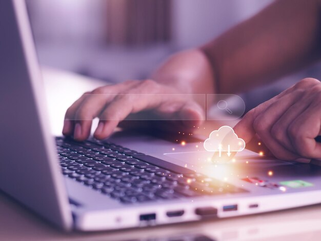 man's hands are using a computer notebook to searching for information using search console