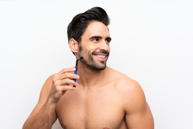 Man shaving his beard