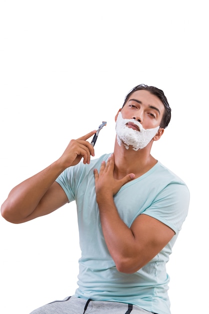 Man shaving isolated on the white background