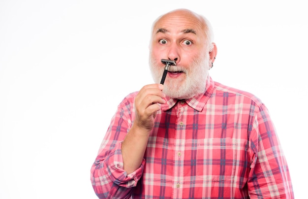 Man shaving shaving razor blade tool kit cut and brush hair barbershop concept shaving accessories unshaven old man has moustache and beard mature bearded man isolated on white copy space