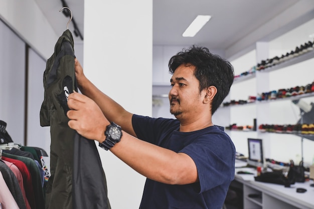 A Man shopping at fashion store