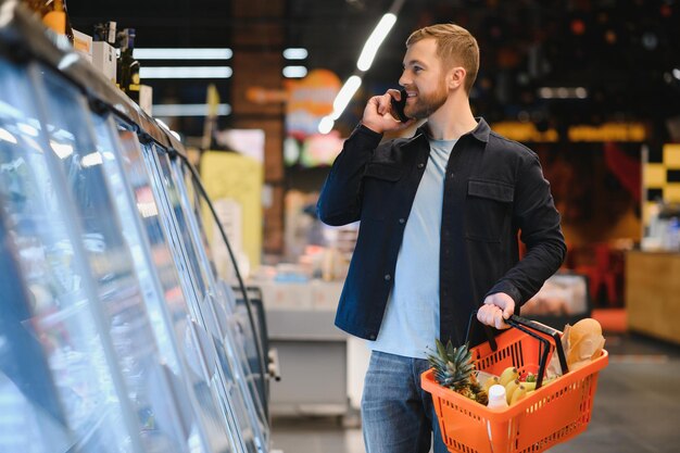 Man shopping in a supermarket