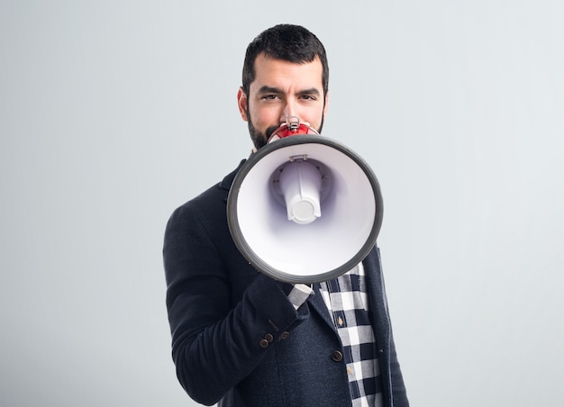 Man shouting by megaphone