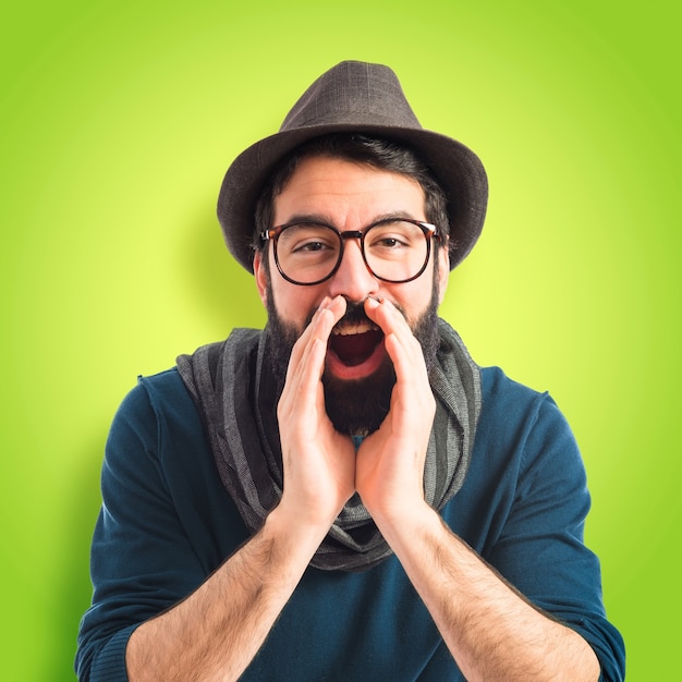 Man shouting on colorful background