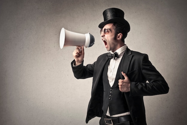 Man shouting into a megaphone