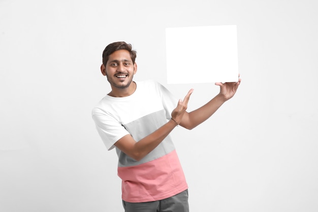 man showing blank signboard