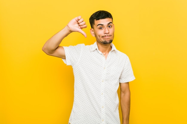 Man showing a dislike gesture