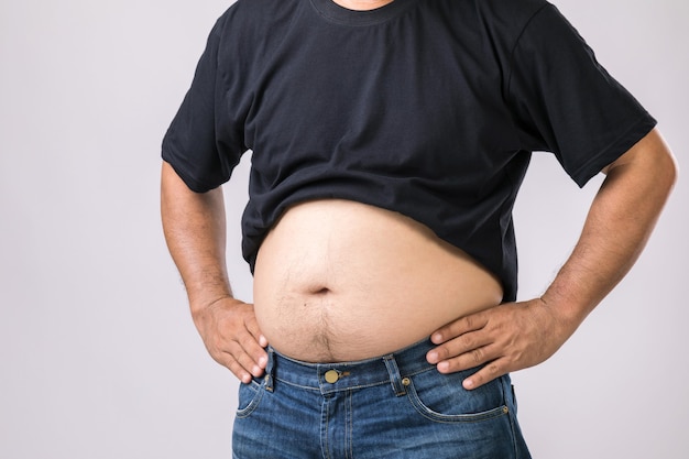 Man showing his big belly