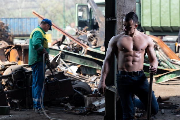 Man Showing His Body With Shovel