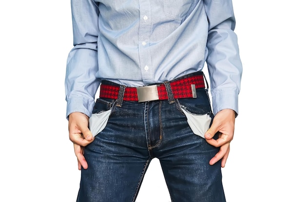 Man showing his empty pockets demonstrating he has no money