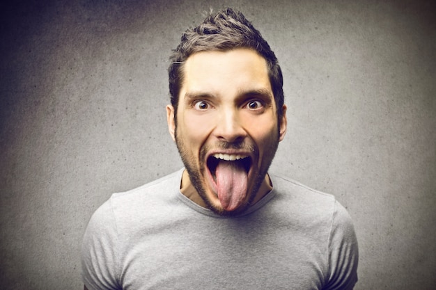 Man showing his tongue