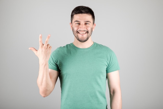 Man showing number by fingers