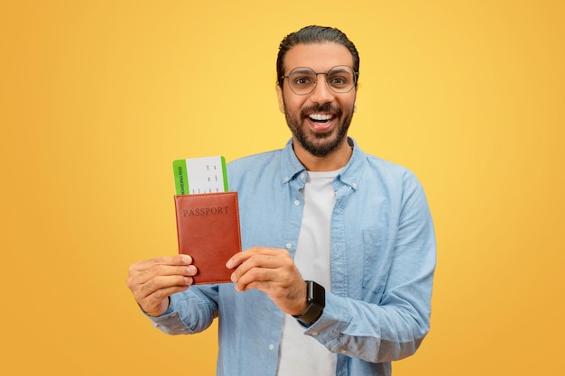 Man showing passport and boarding pass