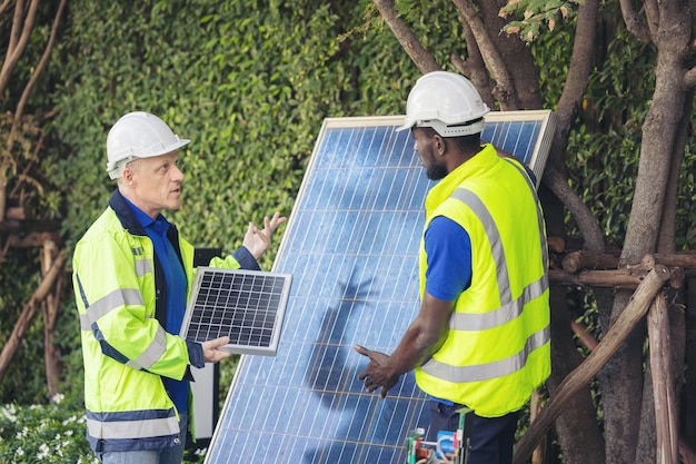 Man showing solar panels technology to engineer team