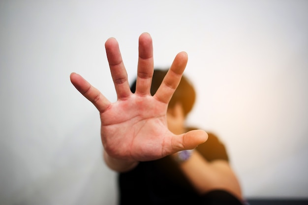 Man showing stop gesture