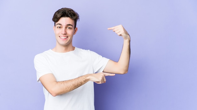 Man showing strength in studio