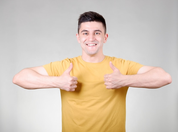 Man showing thumb up