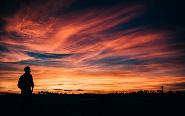 Man silhouette in the beautiful sunset