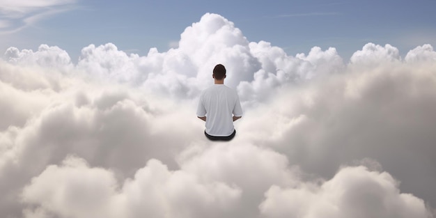 A man sits in the clouds above the clouds