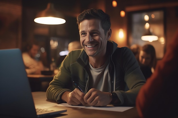 A man sits at a table in a bar smiling and signing a document