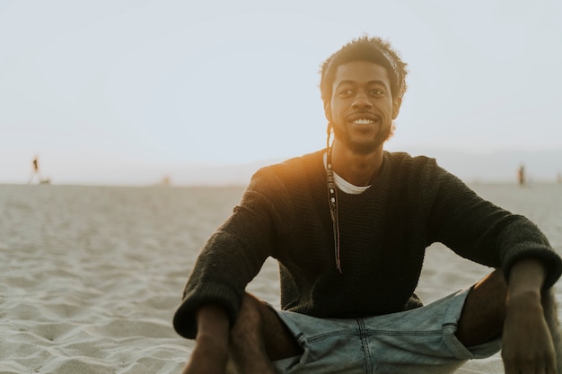 Man sitting at the beach