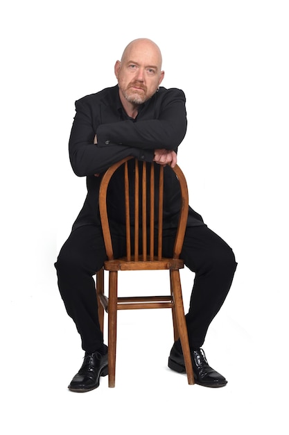 Man sitting on a chair on white background