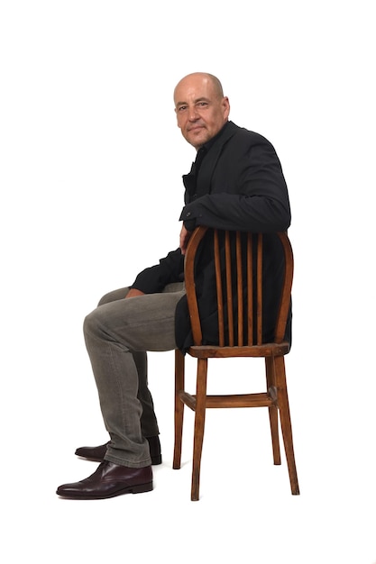 Photo man sitting on chair