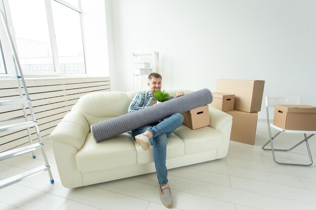 Man sitting on sofa at home