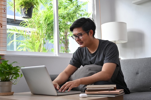 man sitting on table at home