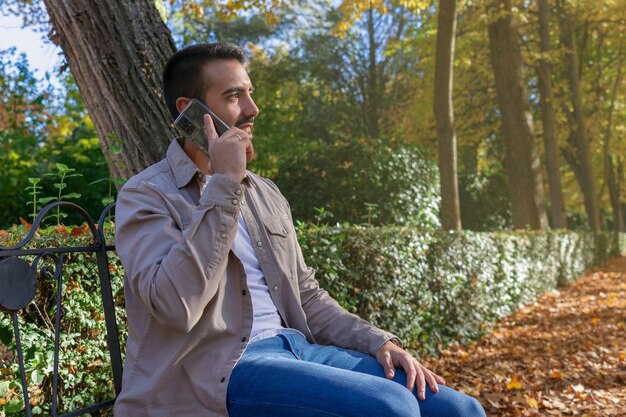 Man sitting talking on the smartphone