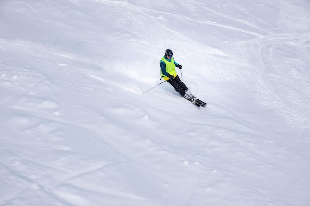 Man skier at ski slope copy space