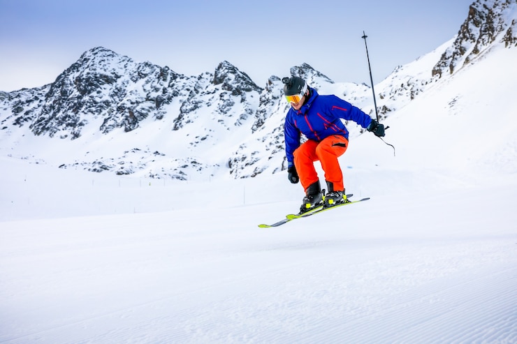 Foto man skiet op de skibaan