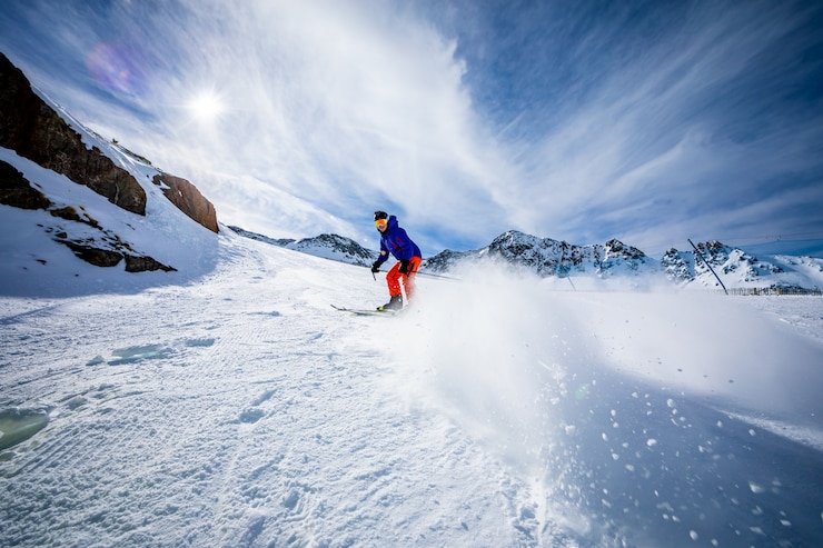 Photo man skiing on the ski slopes